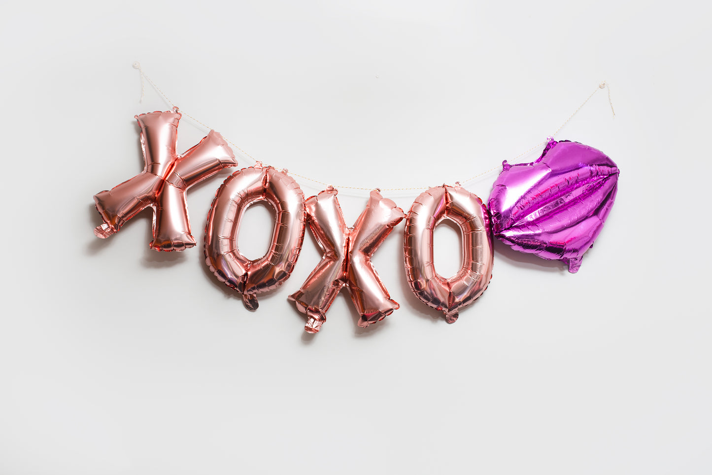 XOXO Foil Balloon Phrase Banner