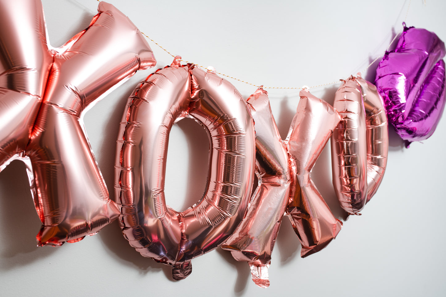 XOXO Foil Balloon Phrase Banner